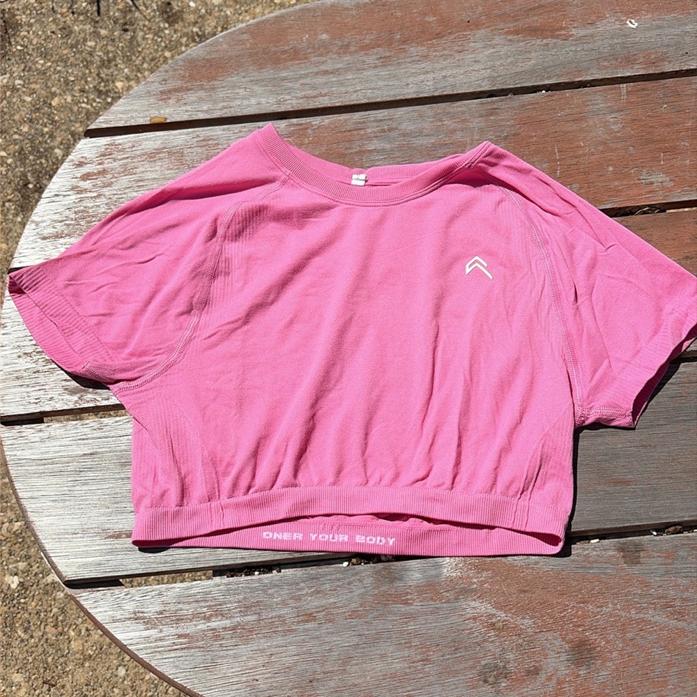 Go to seamless Oner crop top in Peony pink size M